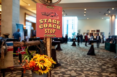 Stage coach stop signage at trade show enterance