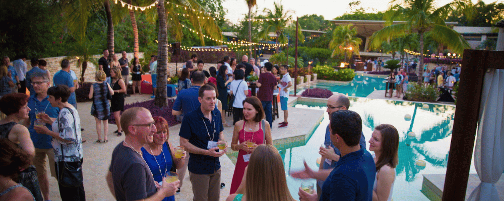 group of event attendees networking during an incentive trip