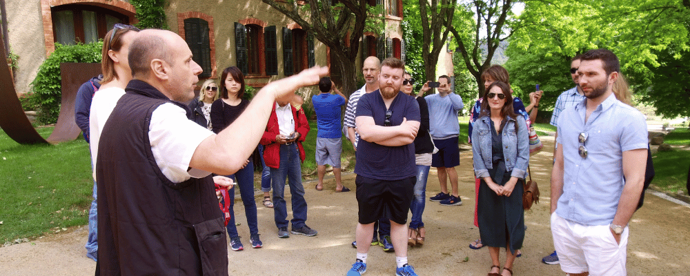 man giving a tour of the city to conference attendees as a workshop activity