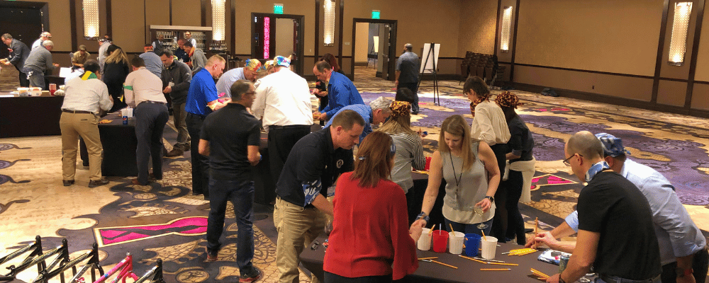 attendees participating in a conference workshop activity