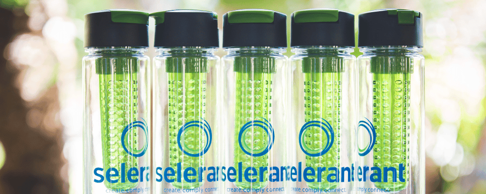 5 plastic water bottles with selerant company logo on them