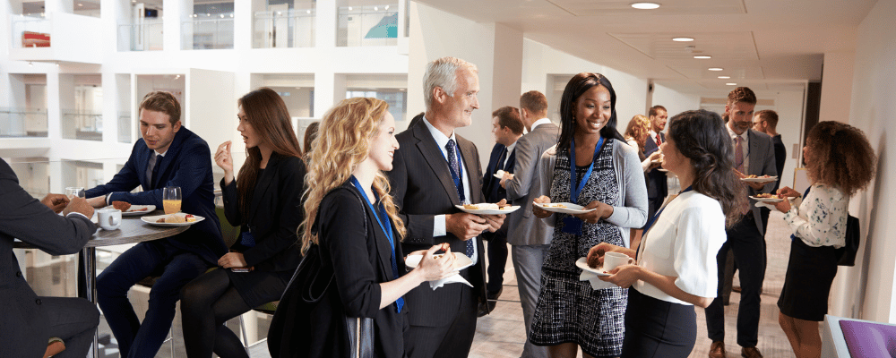 event attendees enjoying dinner at a corporate event