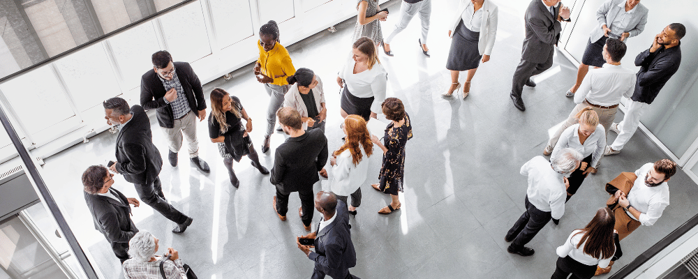 group of attendees networking at a conference