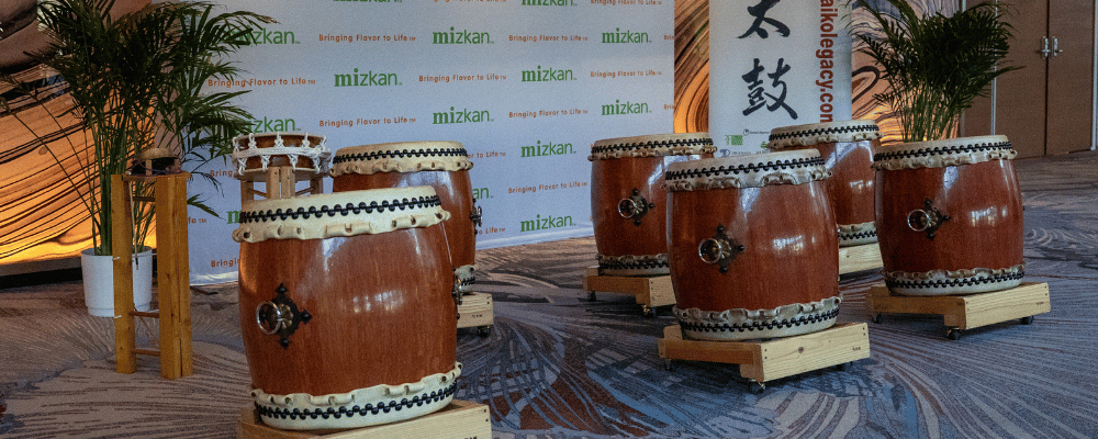 traditional Japanese drums being used as entertainment during a corporate event