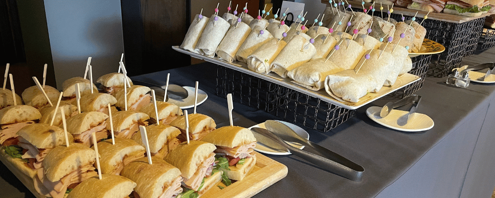 All-inclusive pricing sandwiches at a corporate event