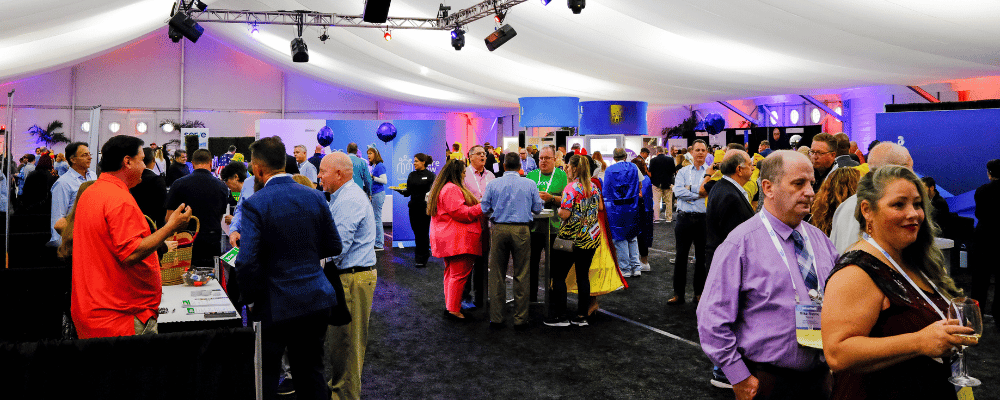 group of event attendees at a franchise convention expo