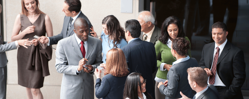 group of event attendees networking during a conference