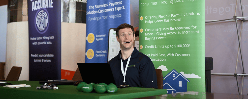 Gen Z conference attendee at an expo conference booth