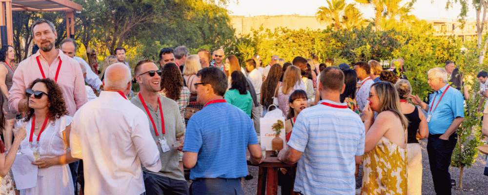 group of conference attendees networking at happy hour