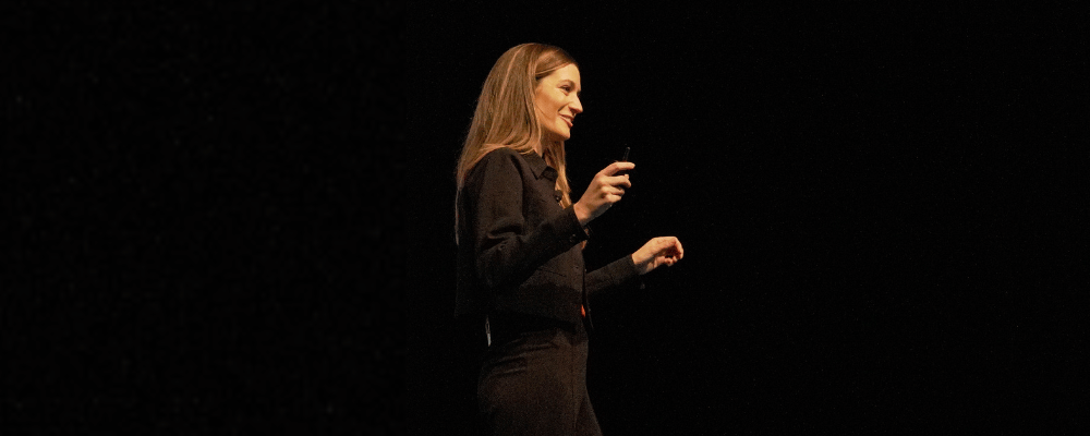 woman giving a conference presentation