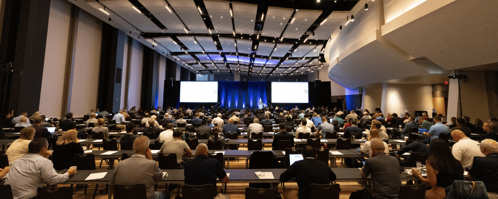 conference attendees watching an event presentation in las vegas