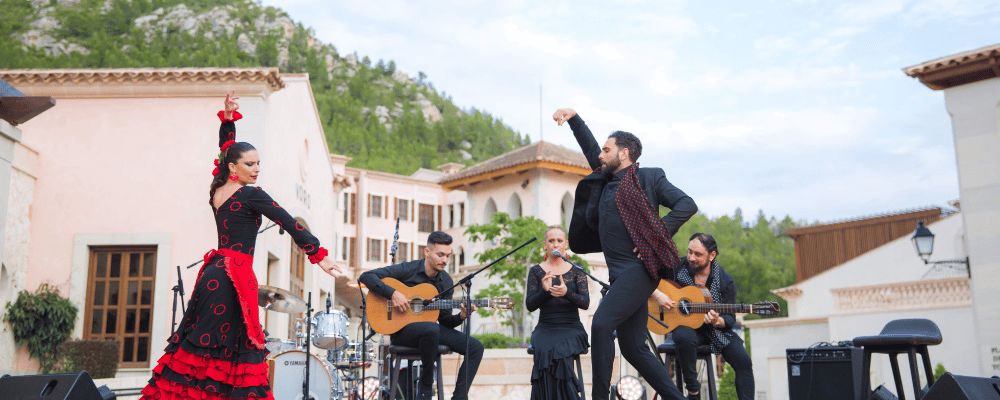 a woman and man dancing flamenco in Mallorca, Spain with live music