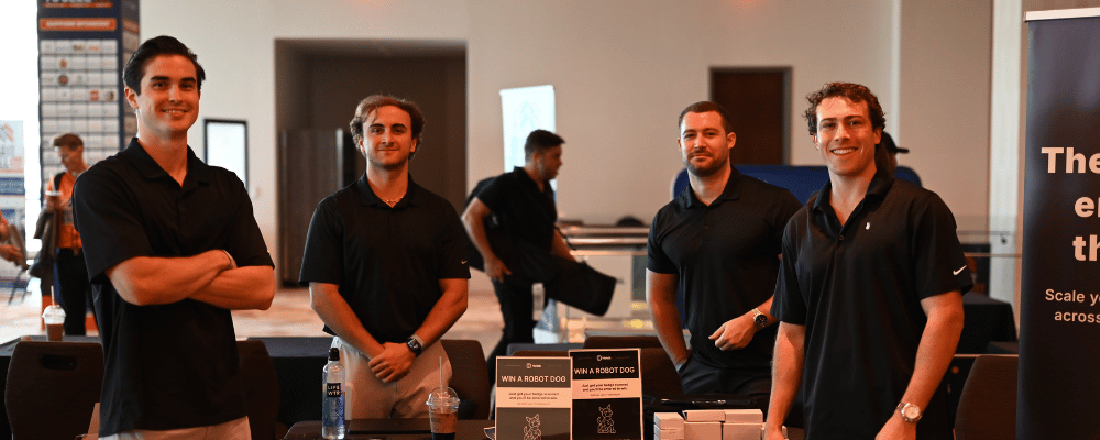 group of attendees at an expo booth