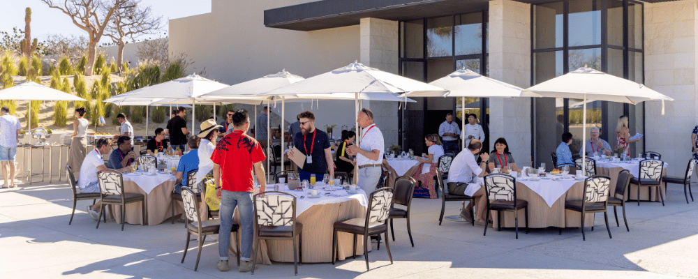 group of conference attendees networking during breakfast