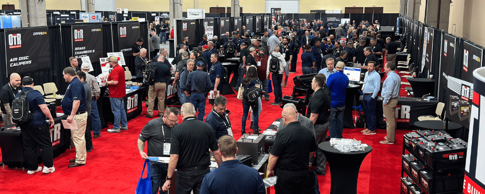 group of attendees visiting a sponsorship expo hall
