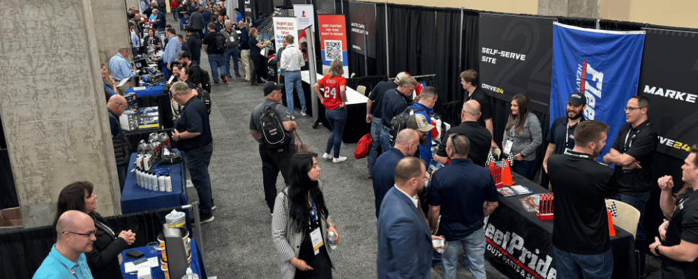 group of attendees visiting a sponsorship expo hall