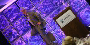 man giving a presentation at a corporate event