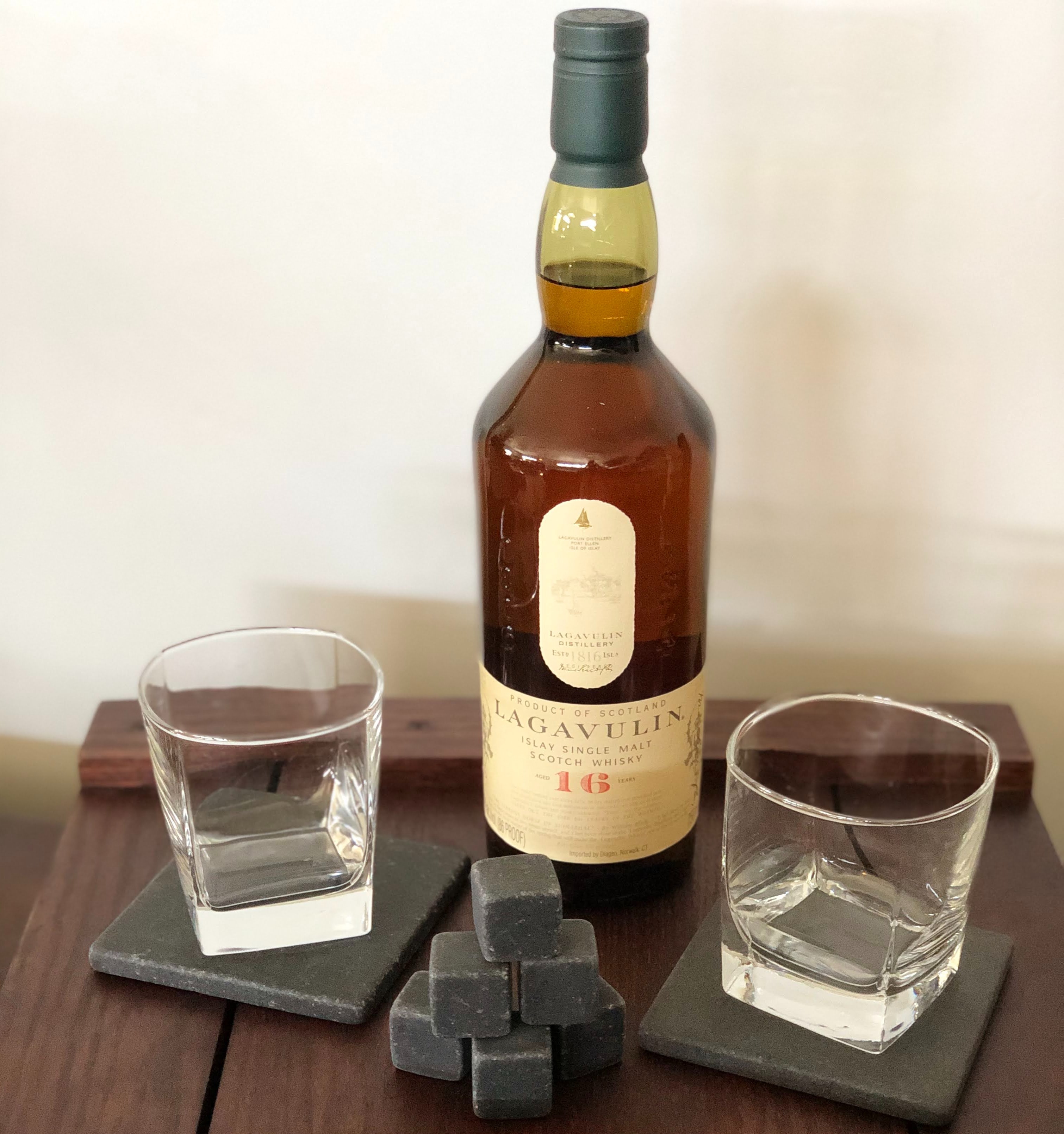 VIP event gift featuring scotch whiskey, whiskey tumblers, and whiskey stones