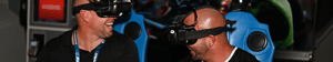 attendees laughing using VR games