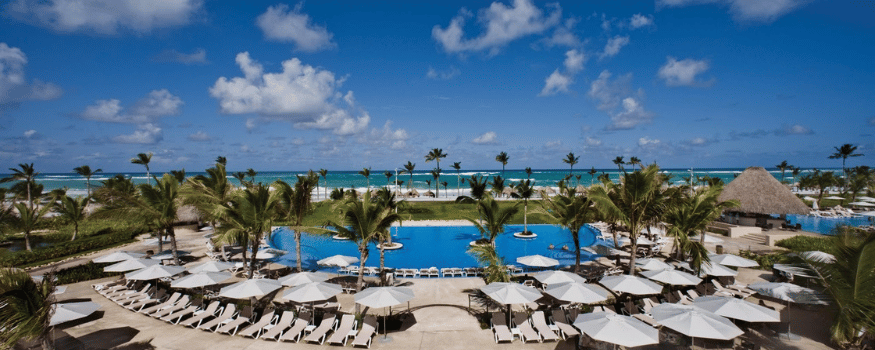 beach resort pool with cabanas