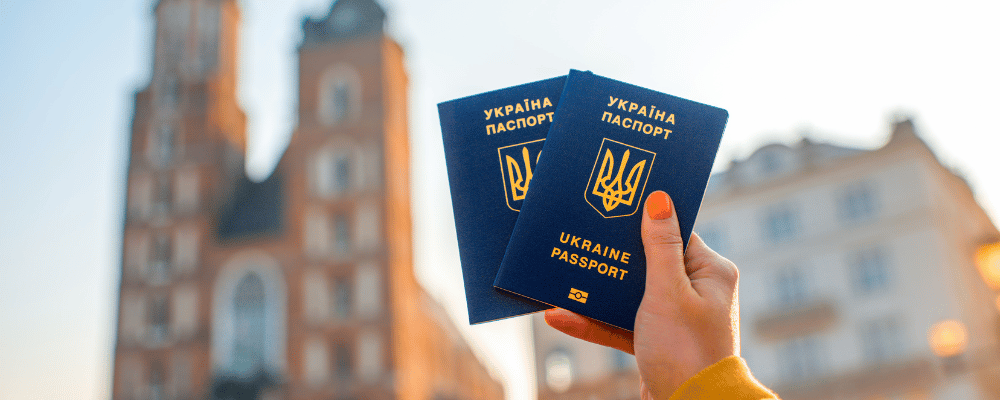 woman holding passports abroad
