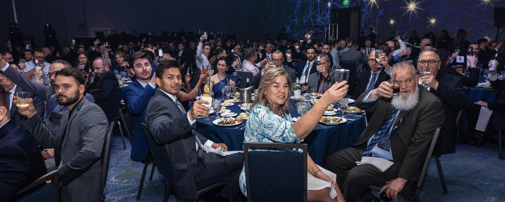 group of attendees watching a conference