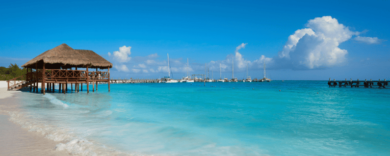 boat floating by the ocean shore