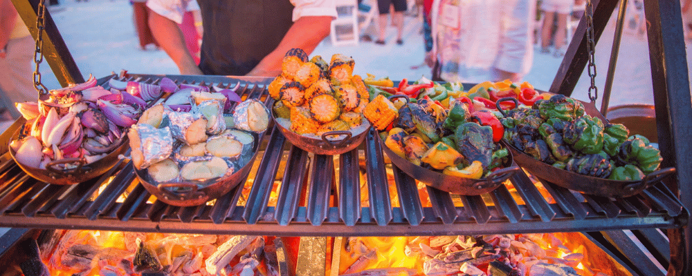 grilling dinner food at an incentive trip over a fire in mexico