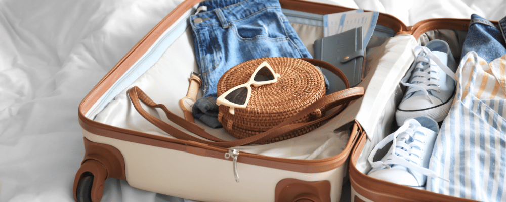 packing a suitcase for incentive trip to Mallorca, Spain