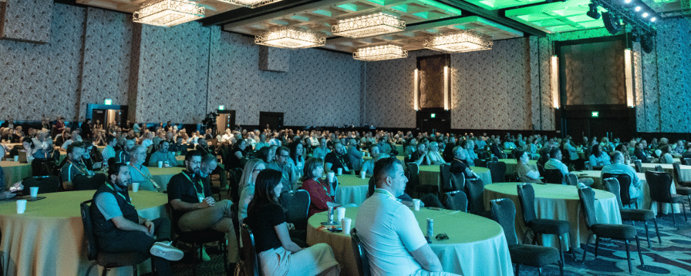 group of attendees watching a conference