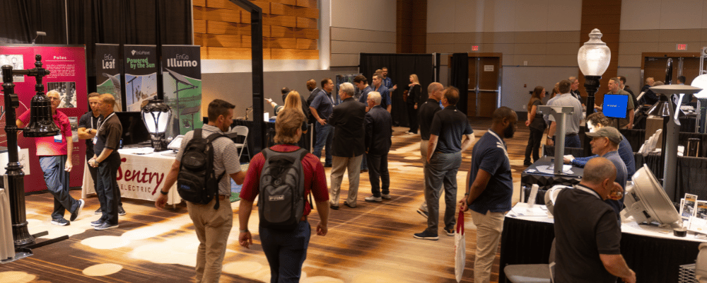 Group of event attendees walking around expo