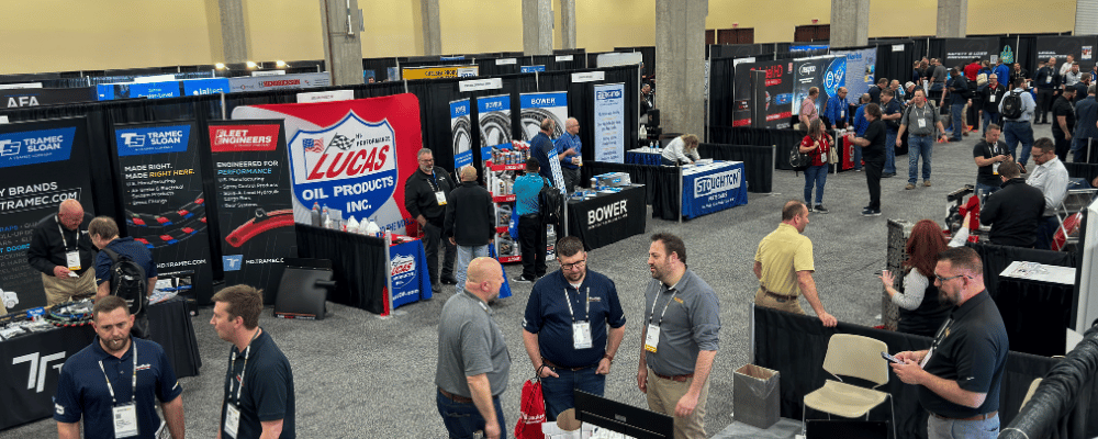 group of attendees walking around an expo during a conference