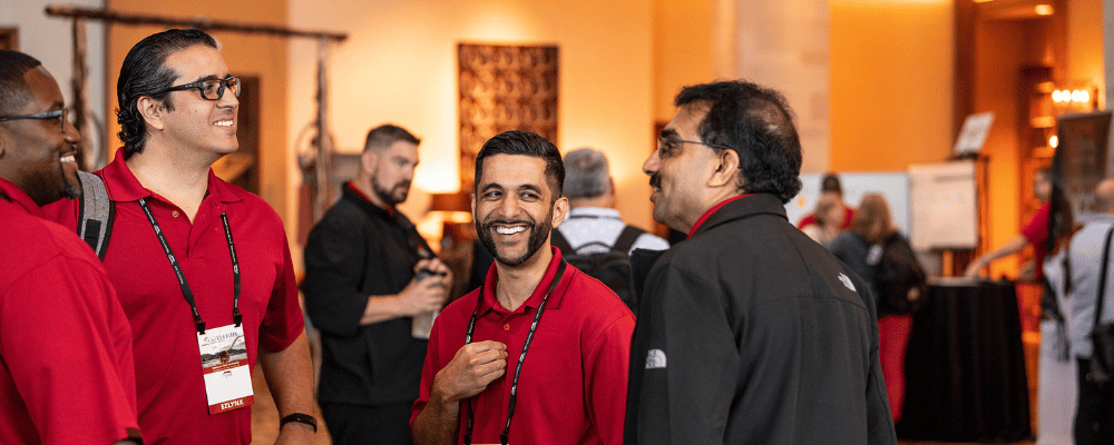 group of event attendees networking during a conference