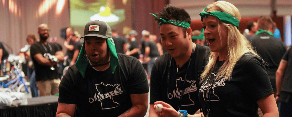 group of attendees playing a game during a corporate conference