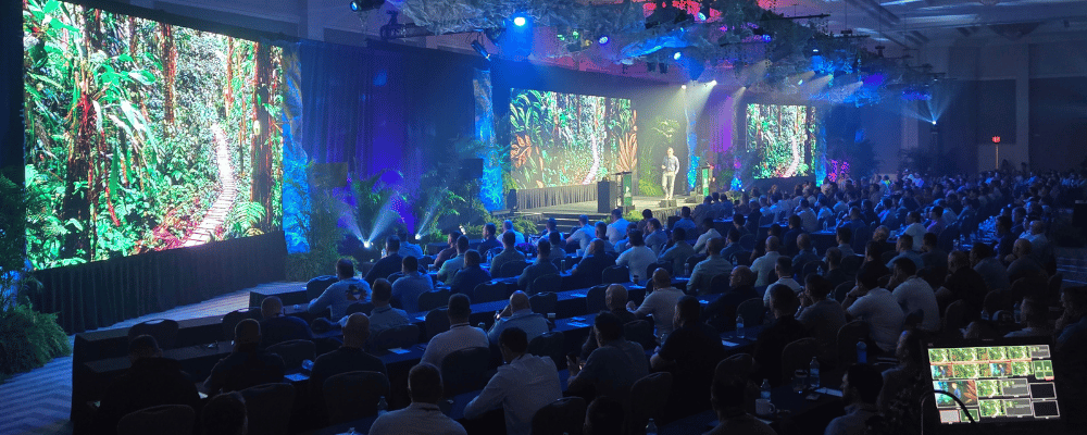 event attendees watching a conference
