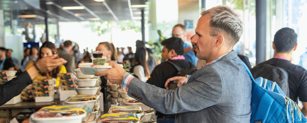 attendee grabbing lunch during a conference