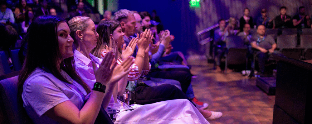 group of attendees celebrating during a corporate event