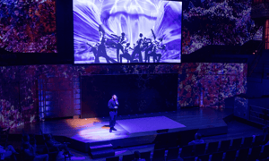 speaker giving a presentation during a user conference