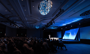 attendees watching corporate event production