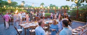group of attendees networking during a corporate event planning 