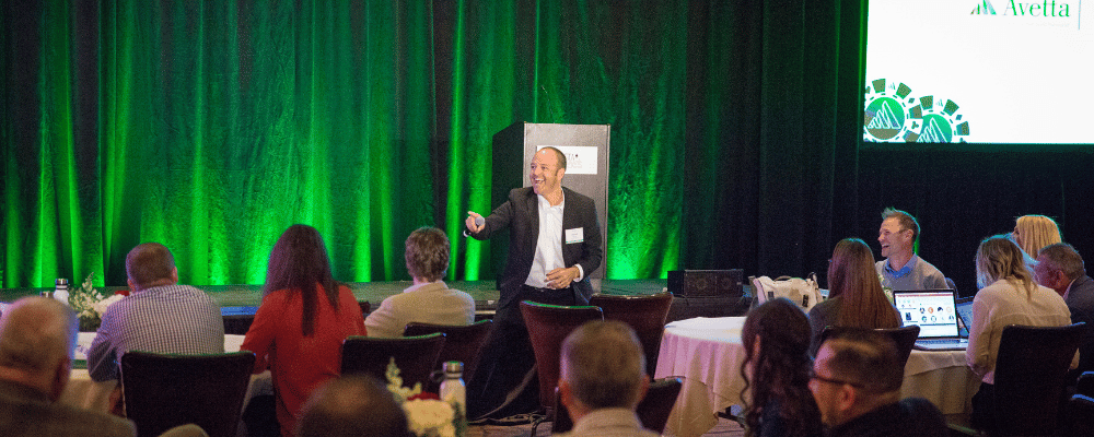 man giving a presentation during a conference