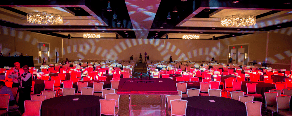corporate conference set up in a hotel ballroom