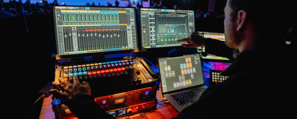 A/V professional working during a corporate event meeting