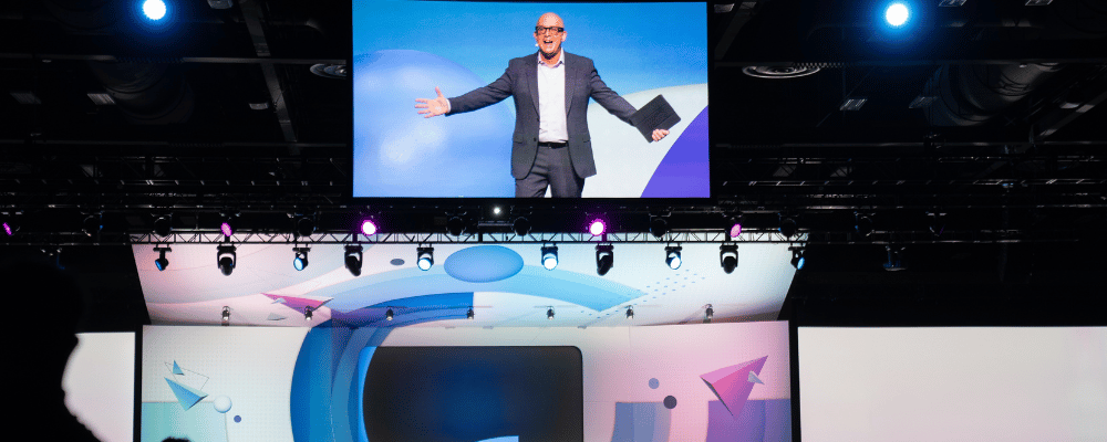 CEO giving a presentation at a corporate conference