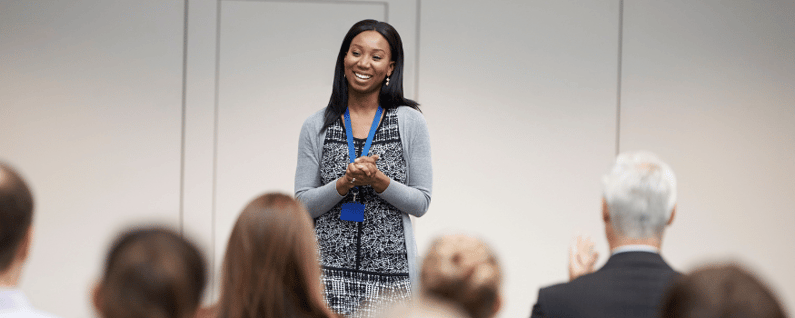 elevator pitch in front of a group of people