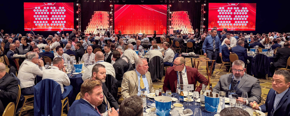 group of attendees having dinner during an awards ceremony
