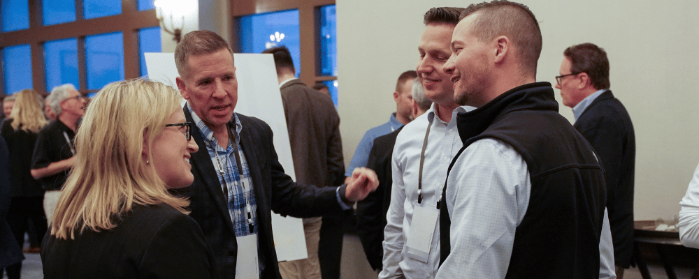 group of event attendees networking during a conference