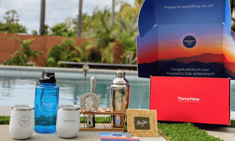 gift box featuring waterbottle, maui jim sunglasses, wine mugs, and bar kit