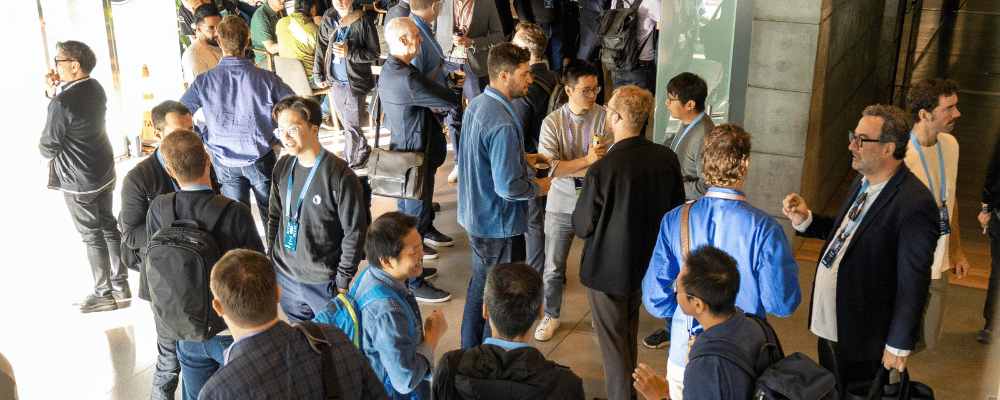 group of attendees networking during a conference