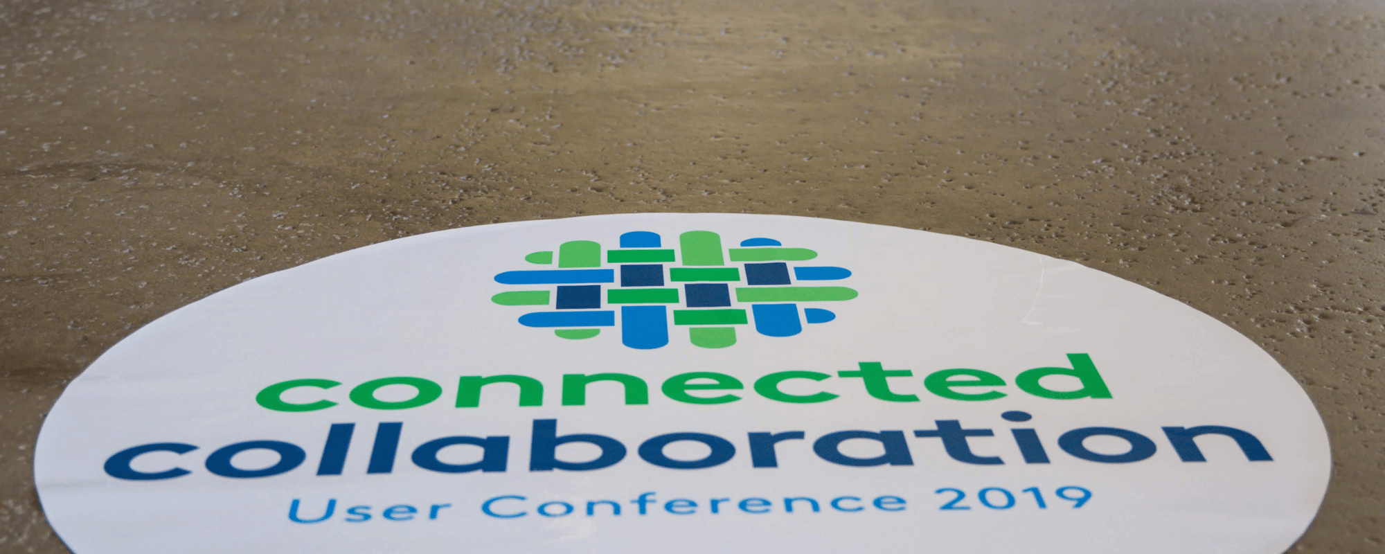 floor sticker showing event branding for a user conference in 2019